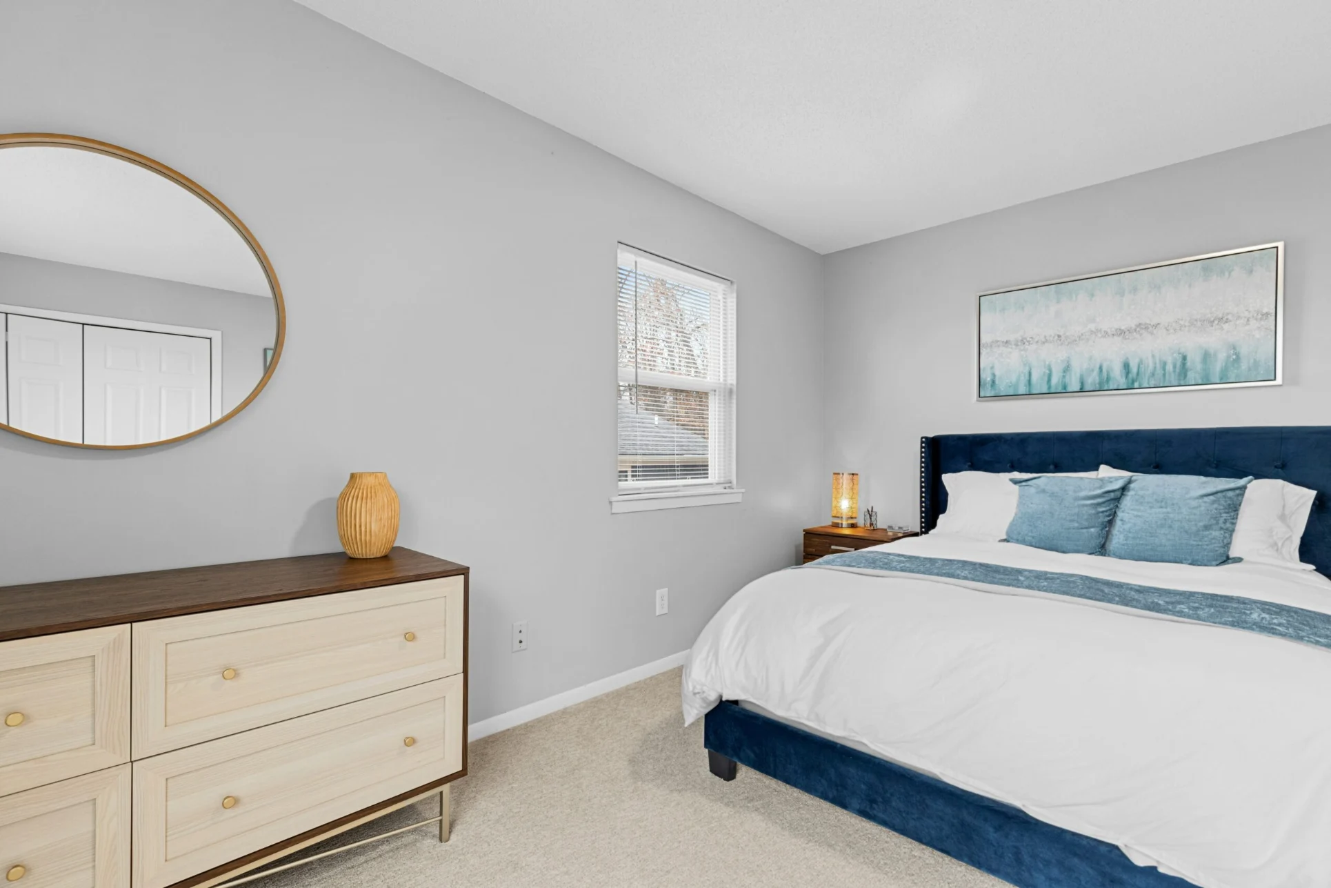 Freshly painted bedroom with smooth wall finishes completed by Precision Painters in Tampa